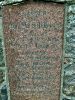 Andresens gravsten indmuret i soklen til kirken i Ullerup